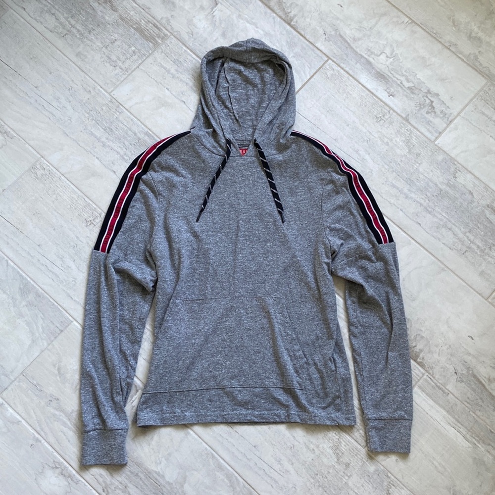 Guess light hoodie with logos along sleeves.